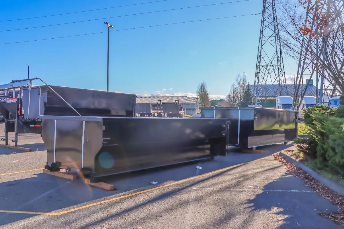 Roll-off dumpster ready for waste disposal at job site for 12 Yard Dumpster Rental in Marshall